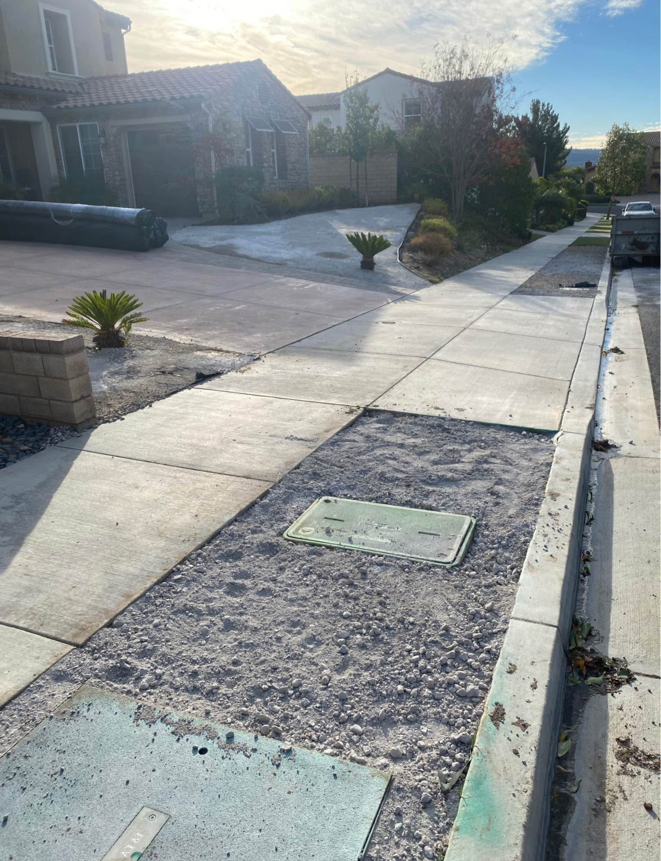 Parkway strip cleared to gravel base before turf