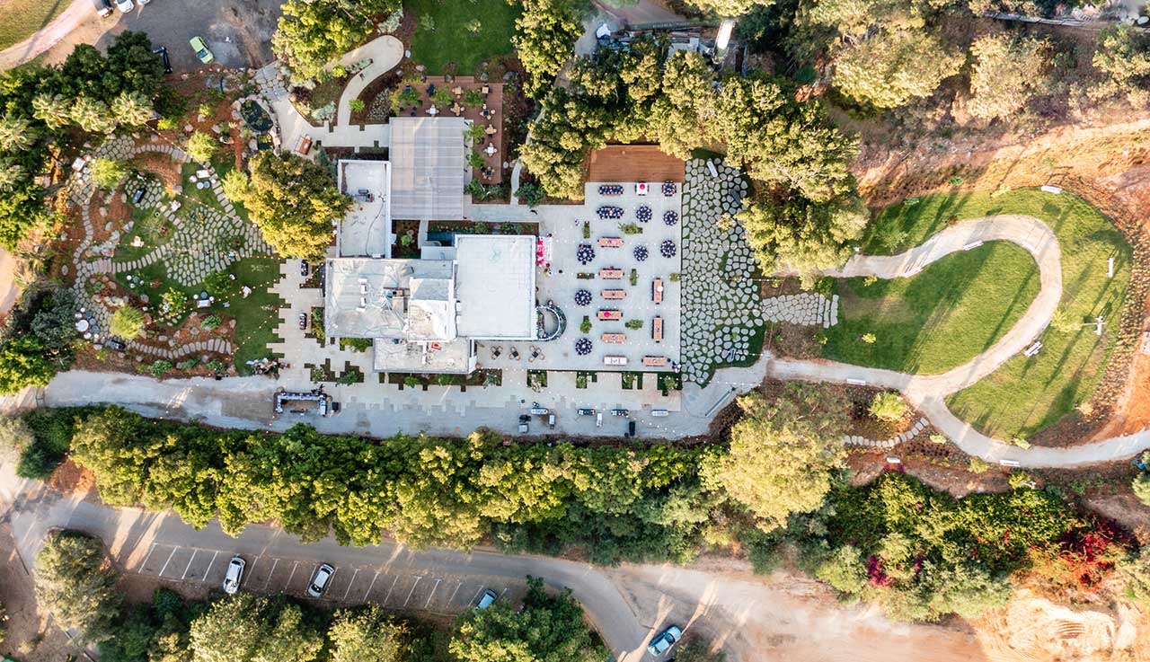 Top-down view of the finished grounds with flagstone patios, lawns and winding paths