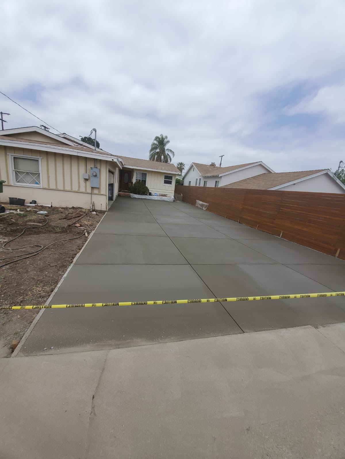 Finished concrete side-yard slab and walkway